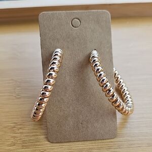 Gold Spiral Earrings with Modern Design
